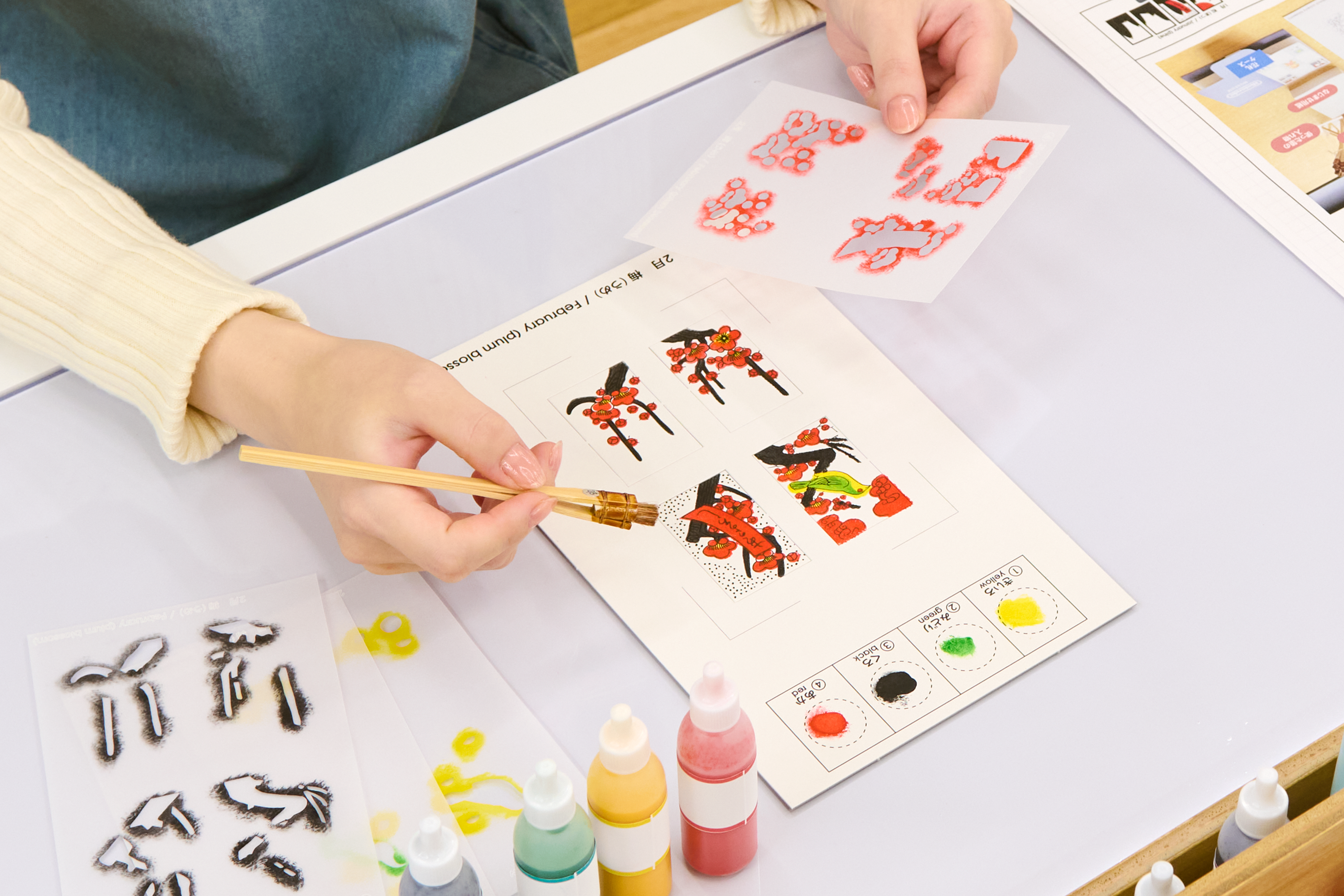 images/_news/2024/0820_nintendo_museum/NintendoMuseum_08_Workshop_Play_Room_Lets_Make_Hanafuda.png